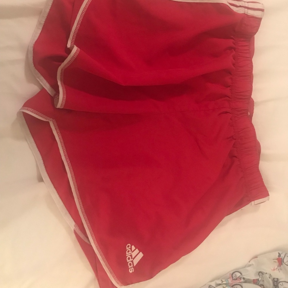Adidas dark pink running shorts